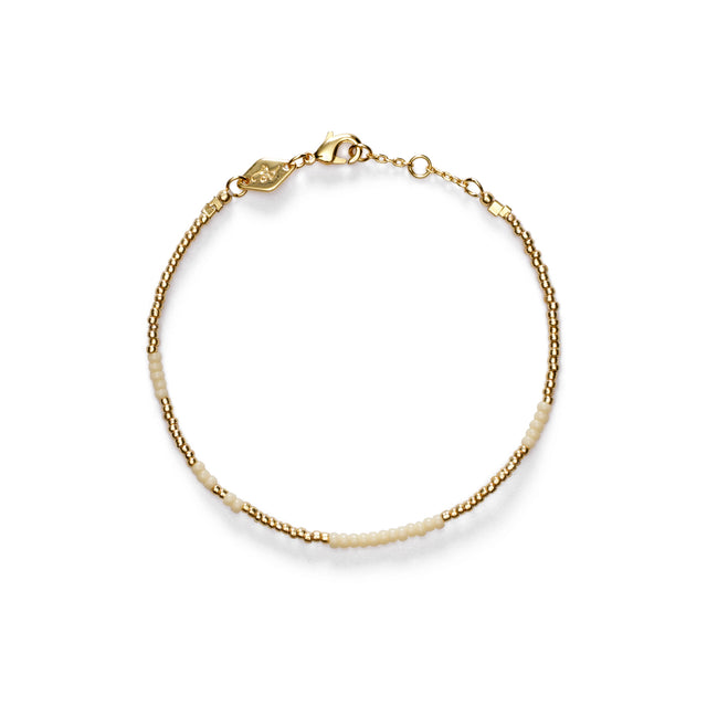 Anni Lu Asym Armbånd Ecru - Smykker i Guld (Gold) Køb smykker hos Adelie. Dametøj på nørrebro og onlline til hele Danmark